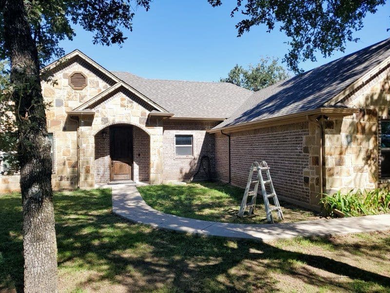 Seamless Gutter Installation Transforms Brock Home image